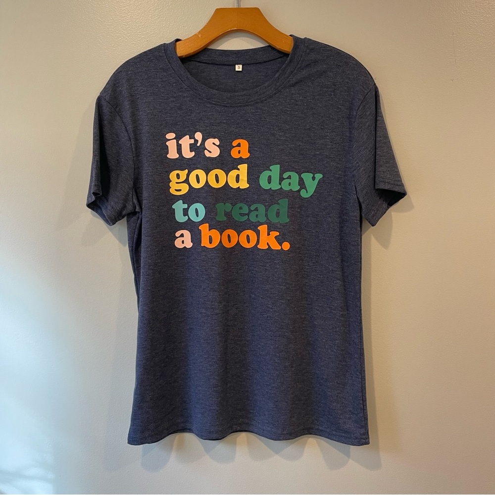 NWOT Graphic Tee,woman’s S, “It’s a good day to read a book”, cotton/poly.